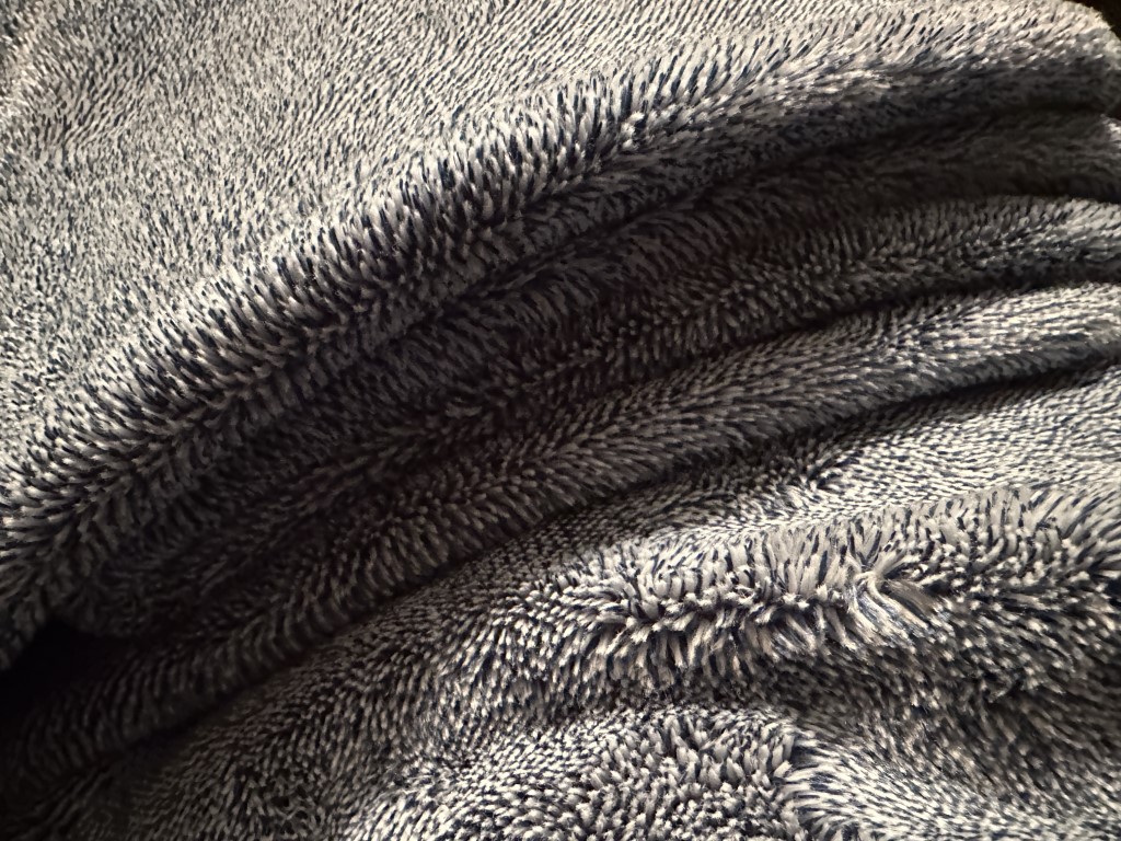 A close-up photo of an LLBean Wicked Plush Throw